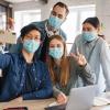 Photo Of Cheerful Students in Medical Masks Taking